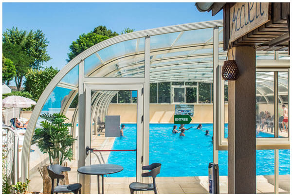 Outside view of the swimming pool at the Parc du Charouzech campsite 